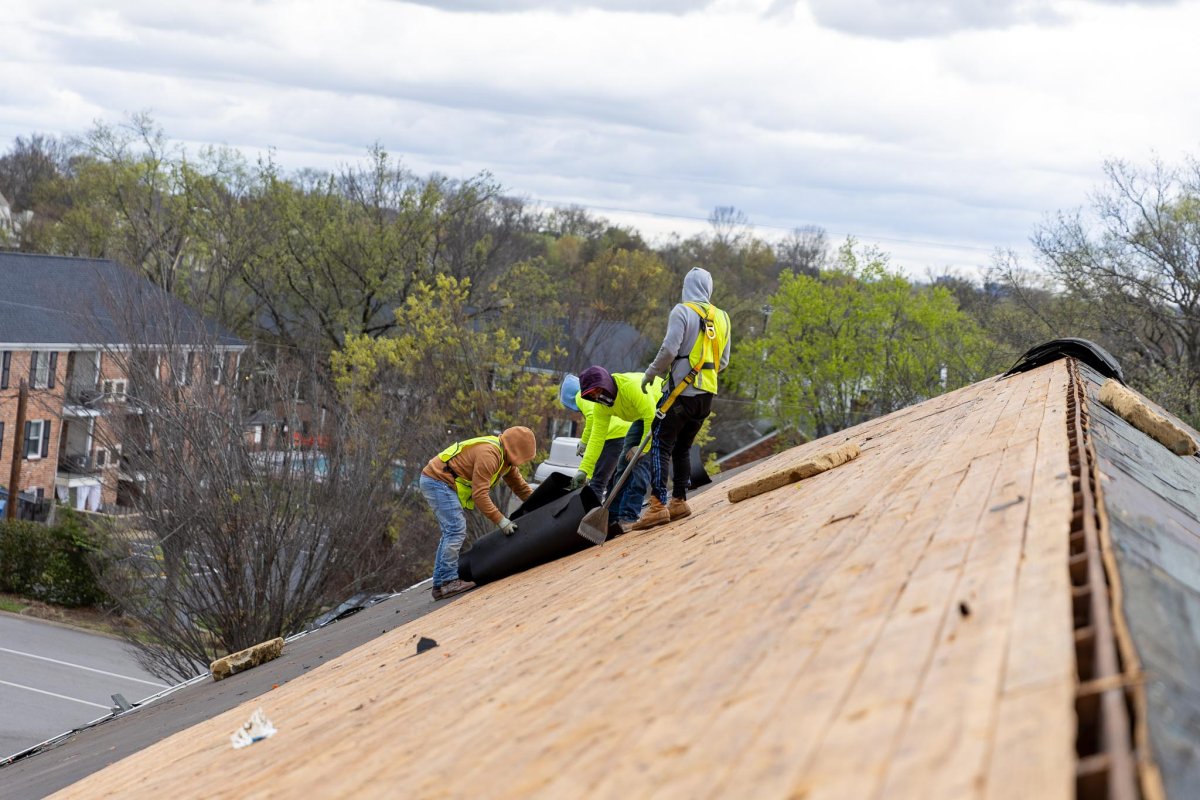 Workers on a Roof
