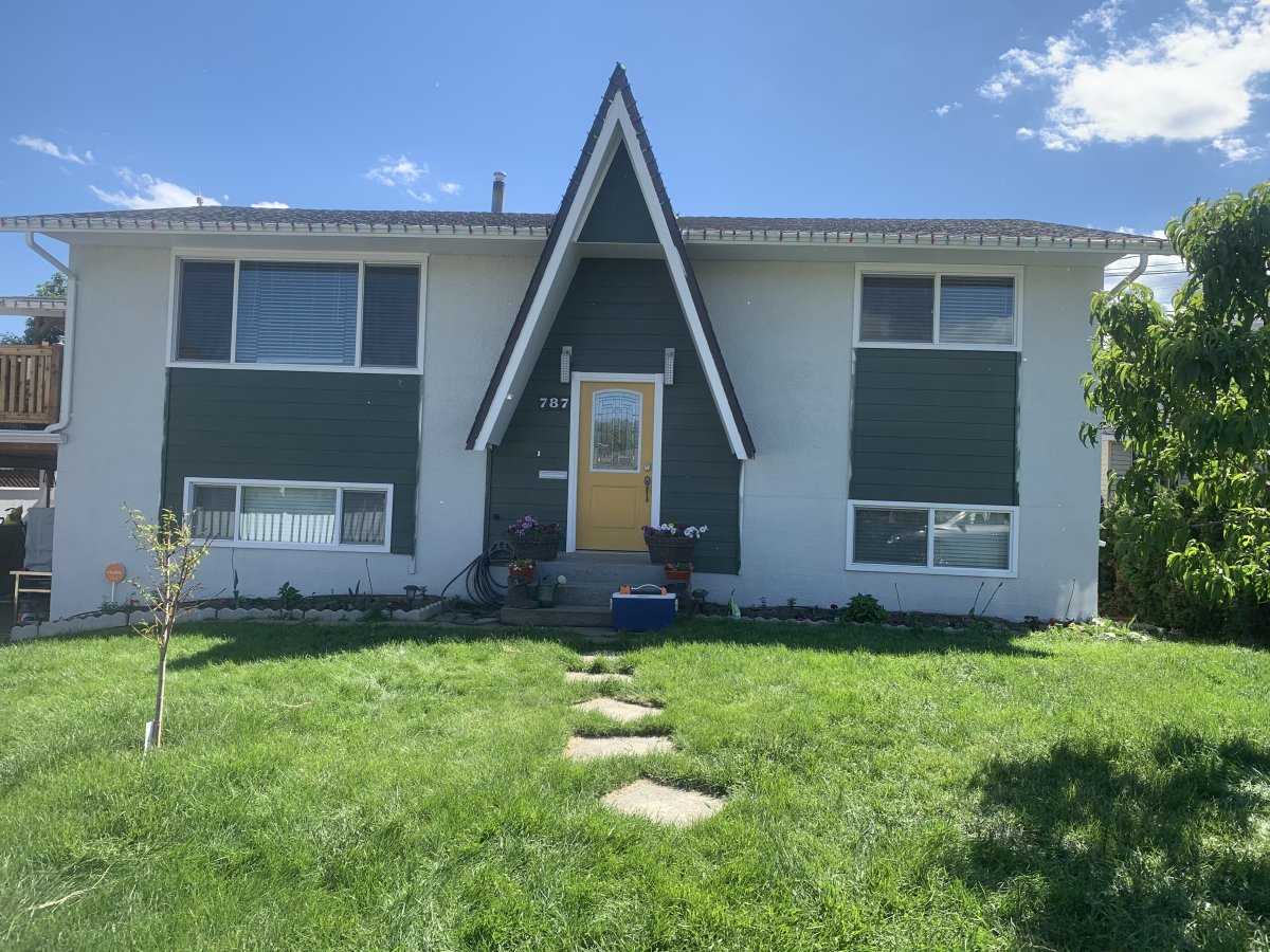 Exterior Stucco repaired & Repainted