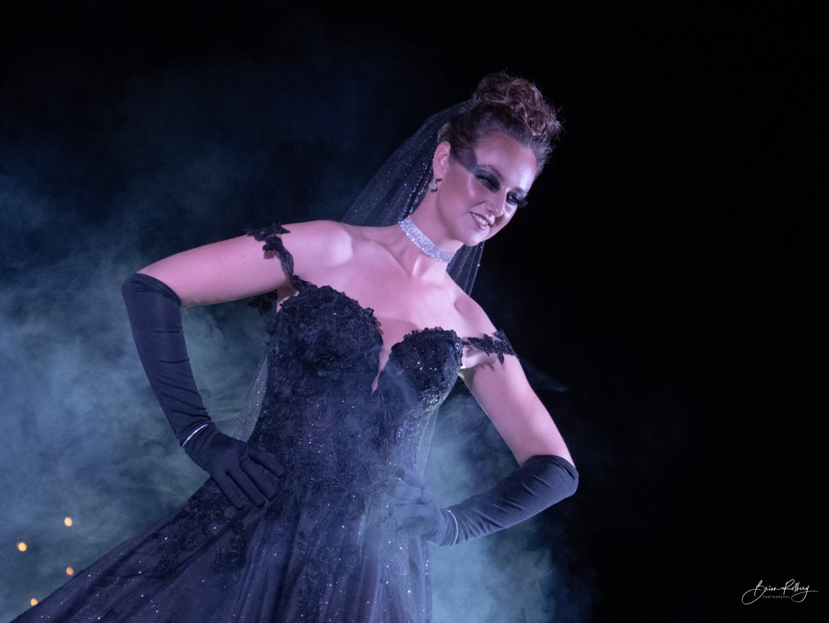 Model wearing black wedding dress